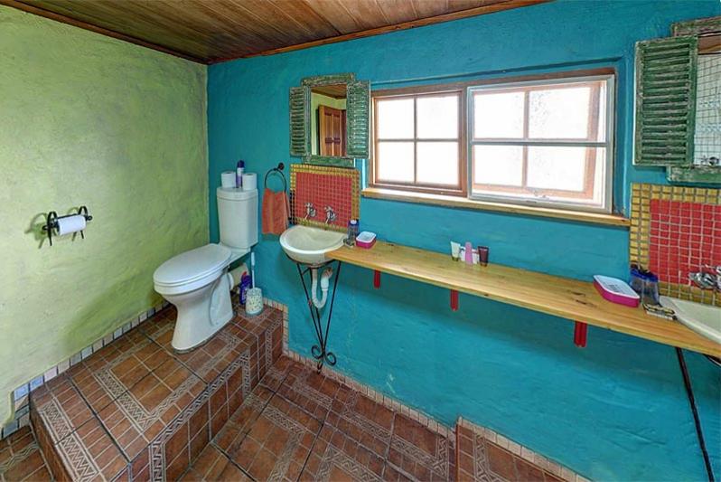 The Mexican loft bathroom with a larger walk-in shower